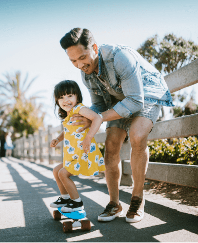 Dad with son riding bicycle